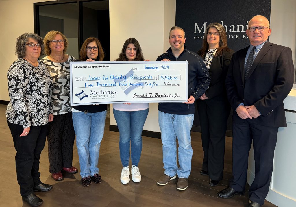 Mechanics Cooperative Bank presents three $5,466 checks totaling $16,400 to the winners of their 2023 Jeans for Charity Fundraiser! From left is Gail Furtado and Beverly Andrade of Forever Paws Animal Shelter, Sharon Levy, Pamela Jamhour and David Correia, Employees of Mechanics Cooperative Bank, and Julie Shaw and Don Duger, of Stanley Street Treatment and Resource 