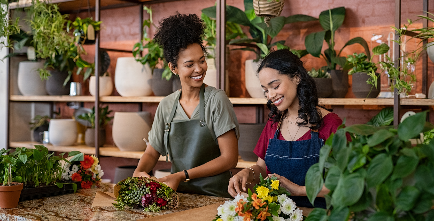 young women working in floral shop